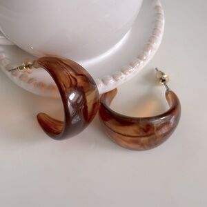 Tan open hoop earrings